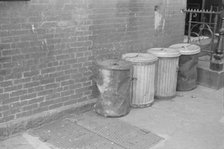 Garbage cans, 61st Street between 1st and 3rd Avenues, New York, 1938. Creator: Walker Evans.