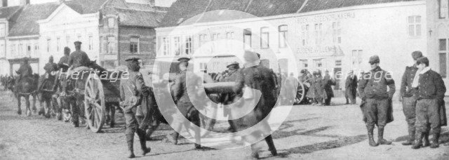 British horse-drawn artillery in a Belgian village, August 1914. Artist: Unknown