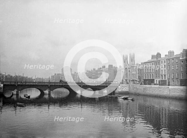 Grattan bridge on the River Liffey and the Ormond Quay Presbyterian Church, Dublin, Ireland, c1898. Creator: Robert Augustus Henry L'Estrange.