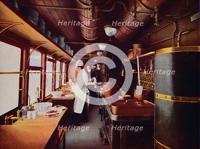 'Inside a Restaurant Car Kitchen on the L.M.S. Railway', 1926. Artist: Unknown.