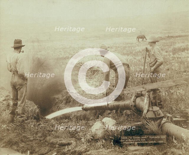 A Golden work Hydroulic [sic] mining at Rockdrville [ie Rockerville], Dak, 1889. Creator: John C. H. Grabill.