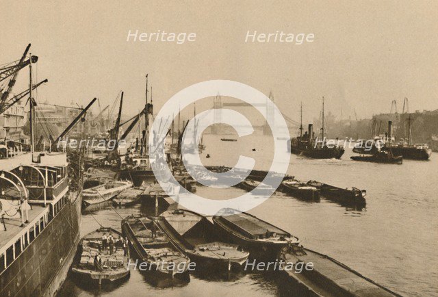 'Shipping in the Pool of London: A Vista from London Bridge to Tower Bridge', c1935. Creator: Donald McLeish.