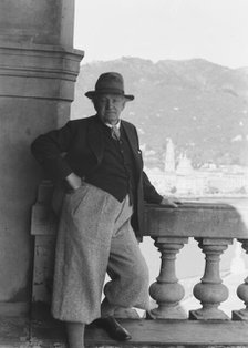 Hauptmann, Gerhart, standing outdoors, 1938 Creator: Arnold Genthe.