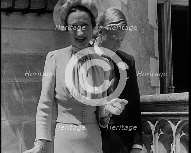 The Duke and Duchess of Windsor Standing in the Grounds of the Chateau de Candé, 1937. Creator: British Pathe Ltd.