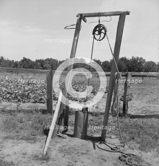 Well, Center County, Oklahoma, belonging to tenant farmer, 1937. Creator: Dorothea Lange.