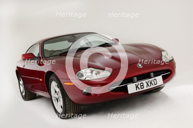1999 Jaguar XK8 coupe Artist: Unknown.