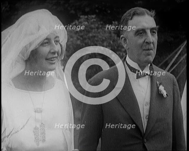 Bride and Groom Standing for Photographs, 1921. Creator: British Pathe Ltd.