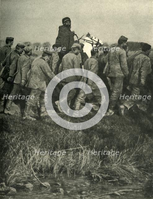 A French North African soldier with prisoners or war, First World War, 1914, (c1920).  Creator: Unknown.