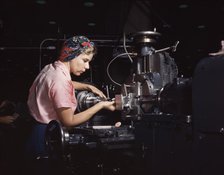 Woman machinist, Douglas Aircraft Company, Long Beach, Calif., 1942. Creator: Alfred T Palmer.