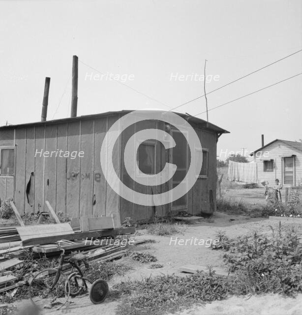Close-up of present dwelling from which family will move into..., near Yakima, Washington, 1939. Creator: Dorothea Lange.