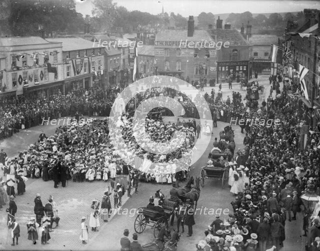 Large crowd in the Market Place to welcome Prince and Princess of Wales, Wantage, Oxfordshire,1898. Creator: Henry Taunt.
