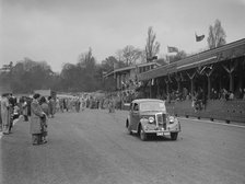 Standard saloon at a race meeting at Crystal Palace, London, 1939. Artist: Bill Brunell.