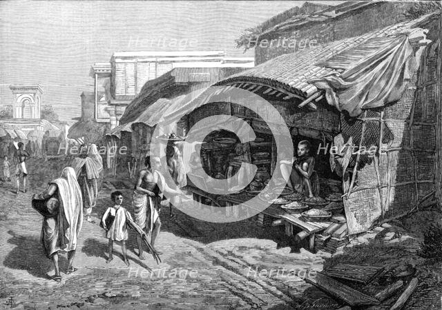 Native shop in Bazaar-Street, Calcutta, 1874. Creator: Unknown.
