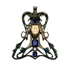 Female Face Pendant, 1897-1898.