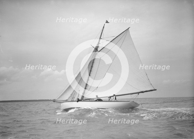 The cutter 'Nanette' sailing close-hauled, 1911. Creator: Kirk & Sons of Cowes.