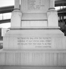 One side of the monument erected to race prejudice, New Orleans, Louisiana, 1936. Creator: Dorothea Lange.