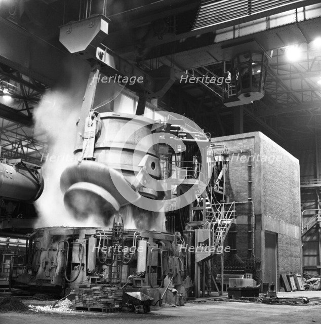 Charging a furnace, Park Gate Iron & Steel Co, Rotherham, South Yorkshire, 1964.  Artist: Michael Walters