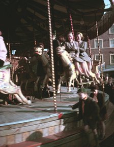 Carousel at a fair, c1955-1965. Creator: Arthur Charles Kirby Ware.