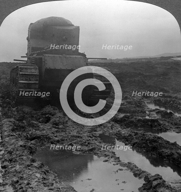 Whippet tank on a muddy battlefield, Morcourt, France, World War I, 1918.Artist: Realistic Travels Publishers
