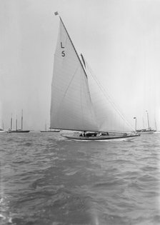 Capt R J Dixon winning the 6 Metre race in 'Jonquil'. Creator: Kirk & Sons of Cowes.