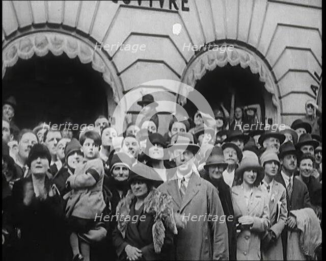 Press and Members of Public Watching Charles Lindbergh and Anne Morrow Lindbergh Waving..., 1920s. Creator: British Pathe Ltd.