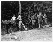 Field Artillery cadets cleaning harnesses on a training hike, Fort Sheridan, Illinois, USA, 1920. Artist: Unknown