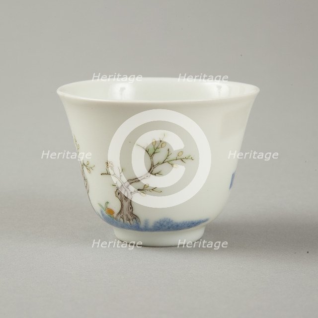 Underglaze blue month cup with polychrome enamelled decoration of a prunus tree. Artist: Unknown.
