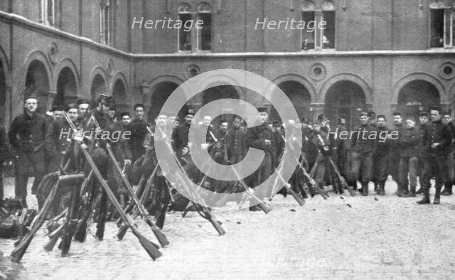 ''Le Defense de Liege; Le 9 de ligne quitte Bruxelles pour se rendre a Liege', 1914. Creator: Henneber.