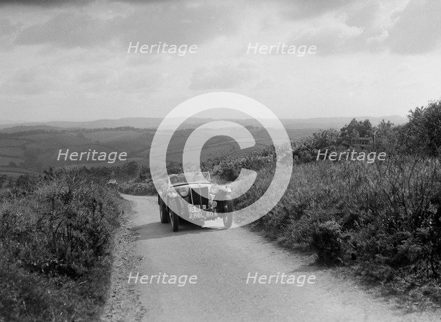 MG TA of JES Jones of the Cream Cracker Team competing in the MCC Torquay Rally, 1938. Artist: Bill Brunell.