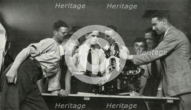 RAF personnel receiving aero-engine instruction, 1941. Creator: Charles Brown.