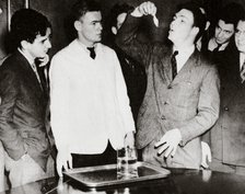 Lothrop Withington, Jr (right), a Harvard freshman, swallowing a goldfish, USA, 1935. Artist: Unknown