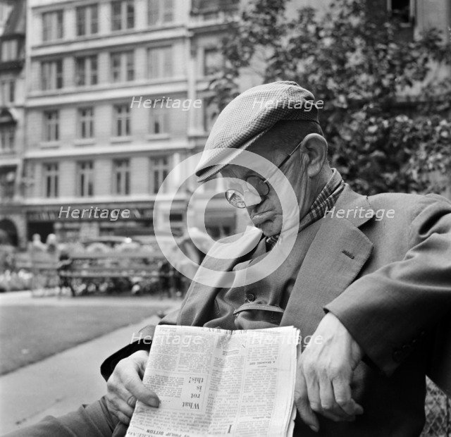 An elderly man asleep with his newspaper, City of London, c1946-c1959. Artist: John Gay