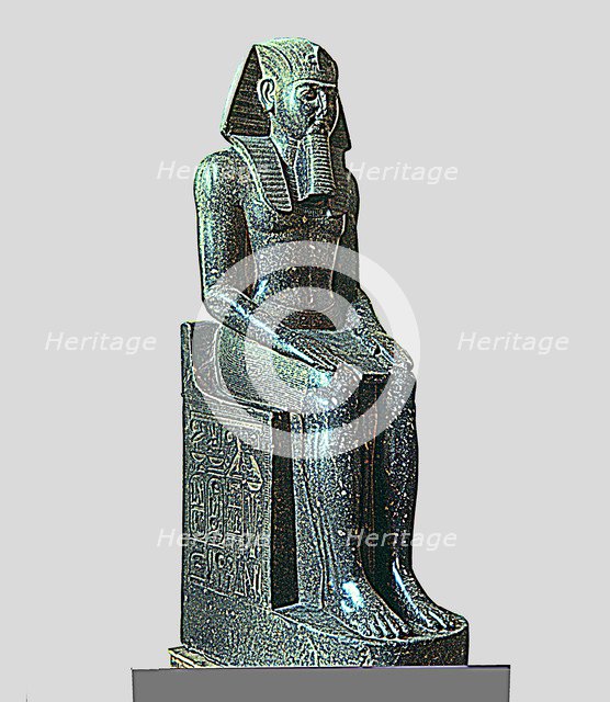 Seated statue of Ramses II, made in diorite, side view, it comes from Tanis.