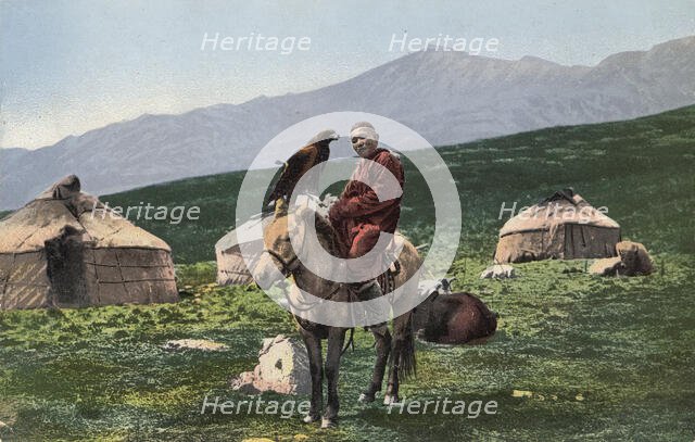 Kazakh with a Golden Eagle, on a Horse with Yurts in the Background, Valley of the Arakan...,1911-13 Creator: Sergei Ivanovich Borisov.