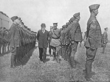 'Mr. Asquith inspecting the Royal Flying Corps', 1915. Artist: Unknown.