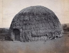 South Africa: an African kraal hut, 1905. Creator: Charles H Simpson.
