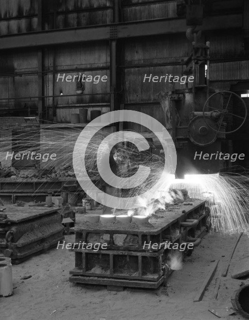 Casting a 1 in 14 rail crossing, Sheffield, South Yorkshire, 1964. Artist: Michael Walters