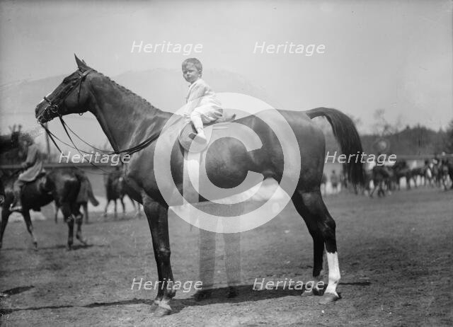 Horse Shows - Baby Vincent Mclean On 'Indian Flower', 1912. Creator: Harris & Ewing.