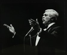 Howard Keel in full song at the Forum Theatre, Hatfield, Hertfordshire, 14 May 1983. Artist: Denis Williams