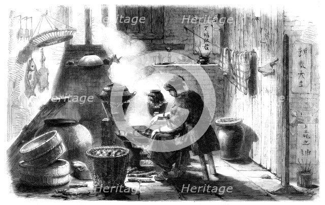 Woman preparing cakes for the Chinese New Year, 1861. Artist: Unknown