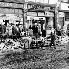 Road repairs in Portobello Road, London, c1956. Artist: Henry Grant