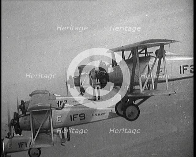 A Fleet of US Fighter Planes Mid Flight, 1920s. Creator: British Pathe Ltd.