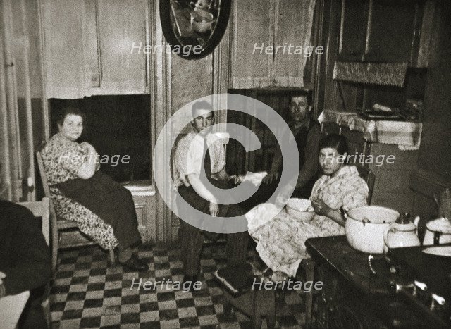 Residents of a tenement, Henry Street, Lower East Side, Manhattan, New York, USA, early 1930s. Artist: Unknown