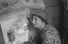 Farm woman in conversation with relief investigator, West Virginia, 1935. Creator: Walker Evans.