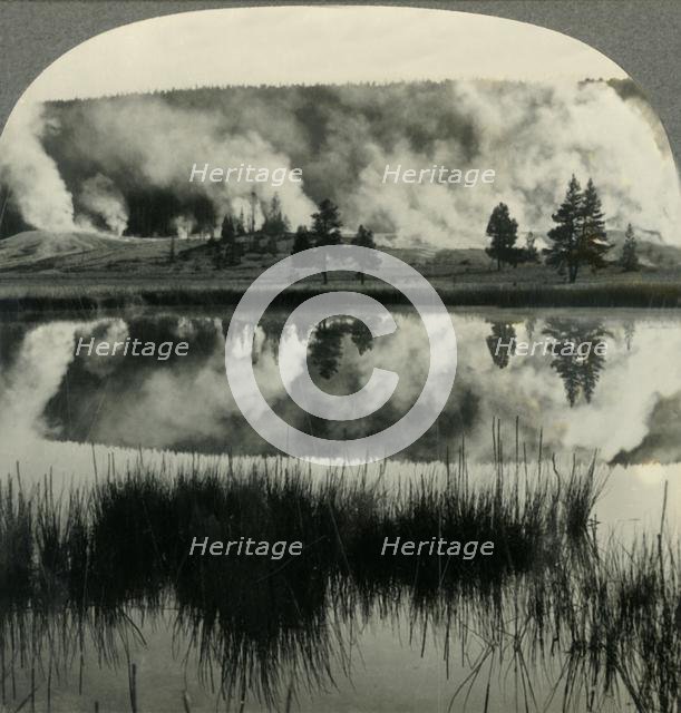 'Sunrise in Yellowstone Park, over Upper Geyser Basin, Wyoming', c1930s. Creator: Unknown.