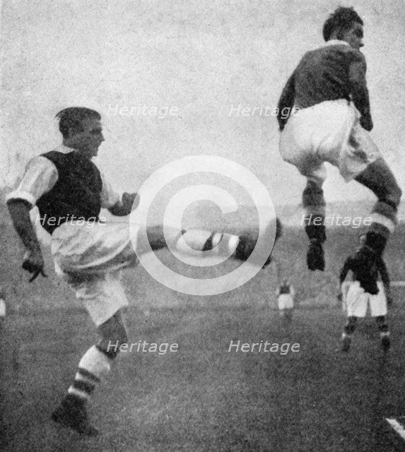 Action from an Arsenal v Chelsea football match, c1936-c1944. Artist: Sport & General