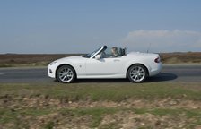 2014 Mazda MX5 Roadster Coupe Artist: Unknown.