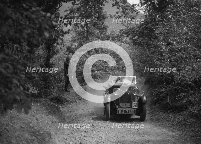 Triumph taking part in a motoring trial, c1930s. Artist: Bill Brunell.