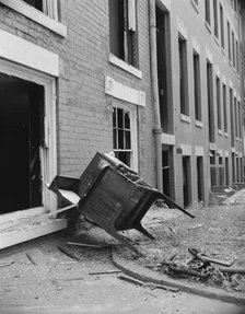 Exteriors of houses being wrecked on Independence Avenue, Washington, D.C, 1942. Creator: Gordon Parks.