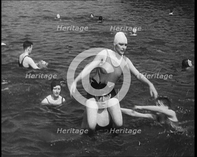 People Playing in the Sea, 1930s. Creator: British Pathe Ltd.